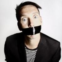 The Boy With Tape On His Face